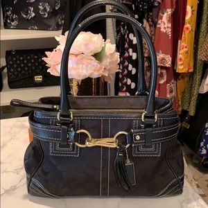Coach black with gold hardware bag